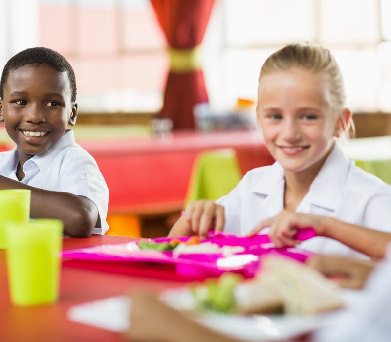 Children having lunch during break time in school cafeteria 754054